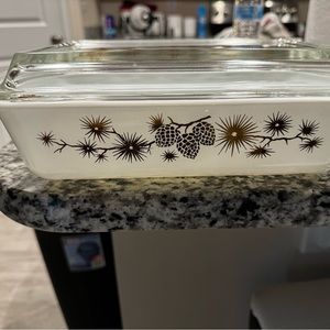 Vintage rectangular Pyrex baking dish with pinecones